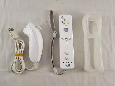 Genuine Nintendo Wii Remote Wiimote Controller With Nunchuck (White)  • $30