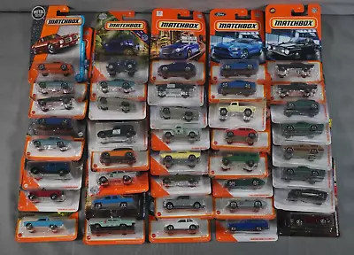 Lot Of 40 Match Box Cars Trucks & More - New In Package • $40