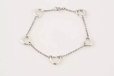 7  Tiffany & Co. 925 Silver Elsa Peretti Open Heart Bracelet (4.31g.) • $500