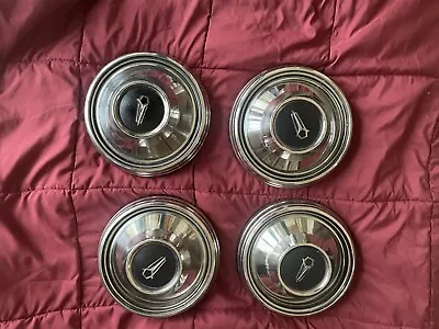 Vintage Oldsmobile Hubcaps • $40