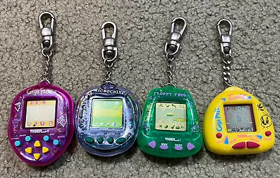 4 Old 1990’s Giga Pets Floppy Frog Microchimp Tweety Faces -  Virtual Pet Lot • $125