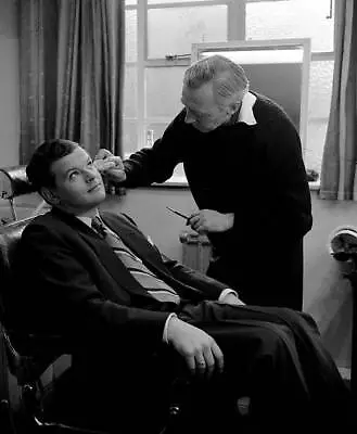 Benny Hill Sits Still In A Chair As A Make Up Artist 1950s Old Photo • $9