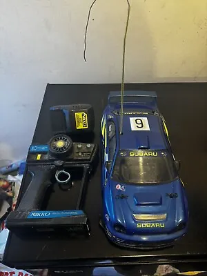 Vintage NIKKO RDC-140102 SUBARU IMPRESZA WRC RC Electric Car  27Mhz 1:14 Scale • £45