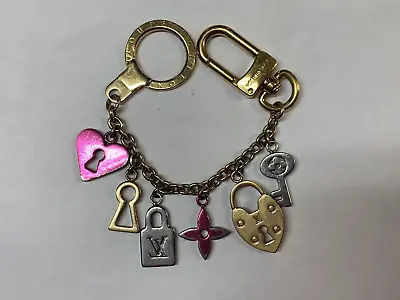 $150 • Buy Louis Vuitton Love Lock Heart Key Bag Charm Keychain M67437