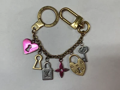 $150 • Buy Louis Vuitton Love Lock Heart Key Bag Charm Keychain M67437
