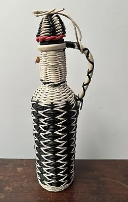 Wicker Wrapped Wine Bottle  • $15