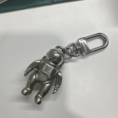 $150 • Buy Louis Vuitton Spaceman Astronaut Moon Man Key Chain Bag Charm Ring Preowned