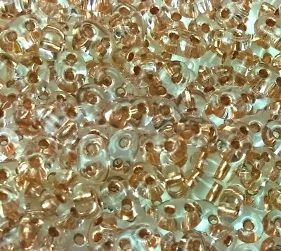 $2.77 • Buy Twin 2 Hole Czech Glass Seed Beads Size 2.5x5 Mm   COPPER LINED CRYSTAL   50 Gm