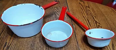 2 WHITE VINTAGE 1930s FARMHOUSE ENAMELWARE SAUCE PANS & 1 LADLE W/RED TRIM • $19.99