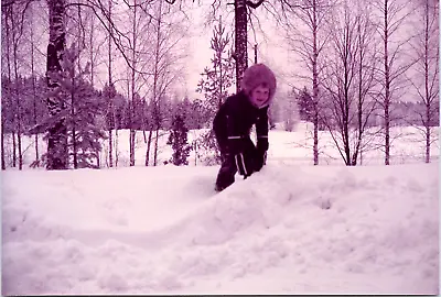 $5.99 • Buy 1970s Photo - Little Boy In Fur Hood Heavy Jacket Smiles & Plays In Snow Finland