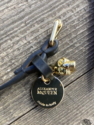 $150 • Buy Alexander McQueen Black Leather Men’s Bracelet With Gold Skull