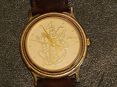 Disney Time Works Goofy Sitting Silhouette Gold Tone Leather Band Watch • $39.99