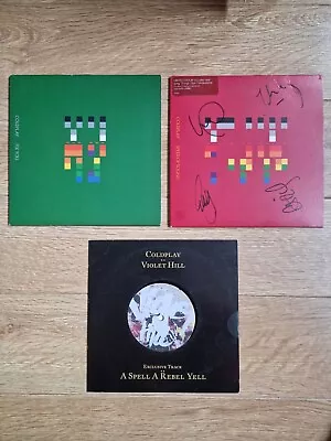 Coldplay 7  Singles One Signed Vinyl • £100