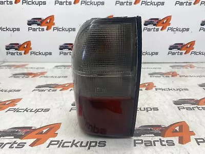 2005 Mitsubishi L200 Warrior Passenger Side Rear/ Tail Light MR981081 1998-2006 • $56.83