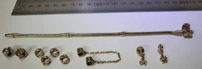 $2000 • Buy Pandora 14ct Gold Bracelet & Charms