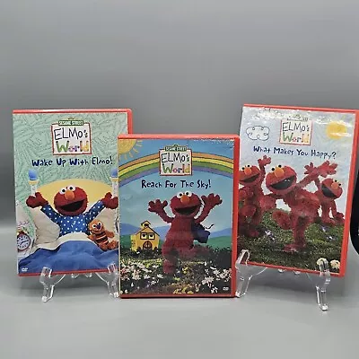 Elmo’s World DVDs Wake Up With Elmo! Reach For The Sky! What Makes You Happy? • $25.65