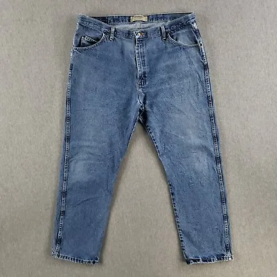 Vintage Wrangler 42x32 Blue Jeans Classic Stone Wash Work Pants • $14.05