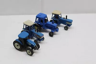 4 Pc Lot Vintage Ford New Holland Miniature Tractors • $13.99