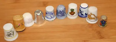 Collectible Miscellaneous Thimbles/Lot Of 10 Thimbles (1-Wood/8-Ceramic/1-Metal) • $9