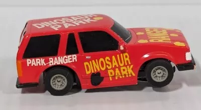 AFX / Marchon MR1 Slot Car Red & Yellow Dinosaur Park Park Ranger • $22