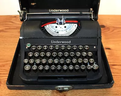 Vintage UNDERWOOD Portable Typewriter Black Steel Round Keys Works W/Case • $49