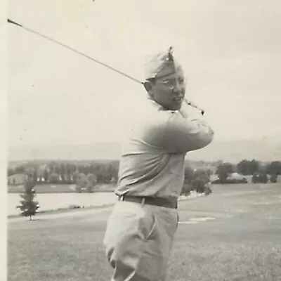 Vintage Snapshot Photo World War II Man Wearing Uniform Glasses Swings Golf Club • $4.80