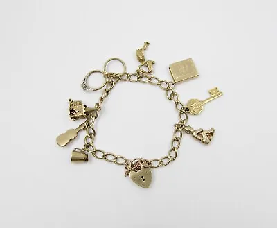 VINTAGE 9ct GOLD CHARM BRACELET WITH 8 CHARMS - CHURCH BIBLE STORK RINGS KEY • £650