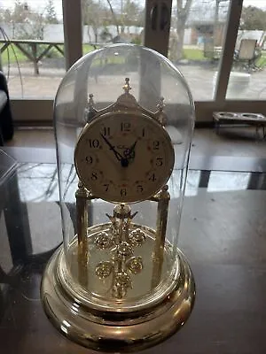 Vintage Elgin American Quartz Clock Anniversary Glass Dome Rotating Pendulum • $25