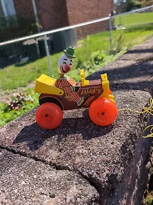 Vintage Fisher Price 1965 Jalopy Clown Pull Car #724.  • $5