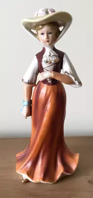 AN 8  TALL X 3.5  WIDE WOMAN IN FLORAL BONNET/LONG BROWN SKIRT FIGURINE VGC • £11.95