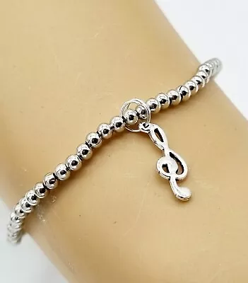 Silver Tone Elastic Bracelet With Metal Balls And Music Note Charm 20cm • £3.49