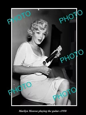 8x6 HISTORIC PHOTO OF MOVIE STAR MARILYN MONROE PLAYING THE GUITAR C1958 • $8.55