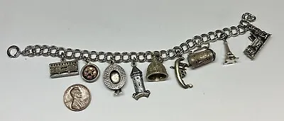 Vintage Sterling Silver Charm Bracelet With 9 Charms • $50