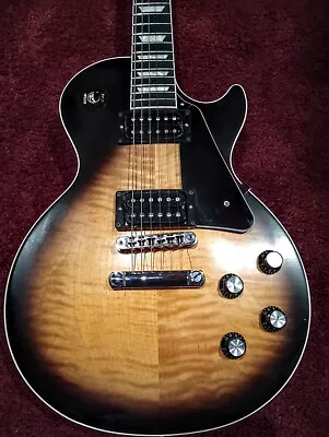 $2100 • Buy 2018 Gibson Les Paul Player Plus Signature Vintage Burst.