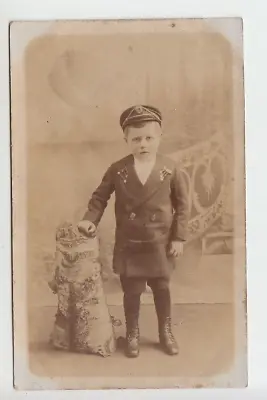 RPPC Young Boy In Sailor Type Suit With Hat. Unknown Studio Setting. • £2.99