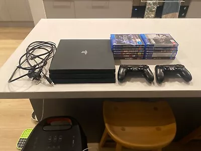 $230 • Buy Sony PlayStation 4 Ps4 Pro 1TB Black Console With 12 Games And 2 Controllers