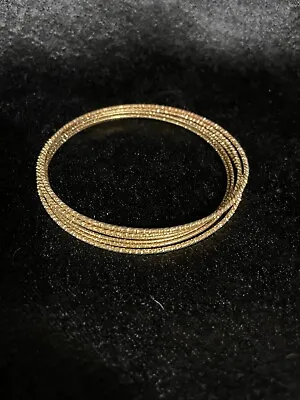 Vintage Set Of Seven Shiny Gold Color Brass Bangle Bracelets • $12.99