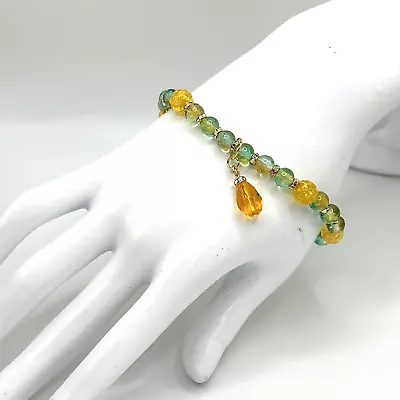 8.5  Beaded Stretch Bracelet -Orange & Aqua Glass & Aurora Borealis Rhinestones • $3.50