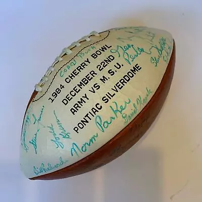 $499 • Buy 1984 Michigan State VS Army Team Signed Official Cherry Bowl Football Nick Saban