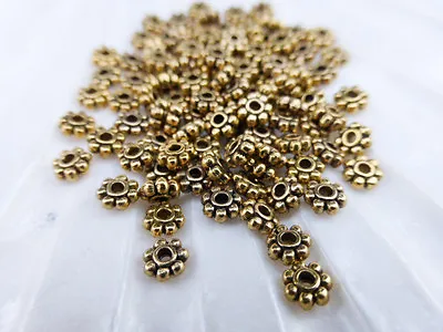 £1.40 • Buy 200 X Tibetan Style Daisy Spacer Beads 4mm Antique Gold LF NF (MBX0090)