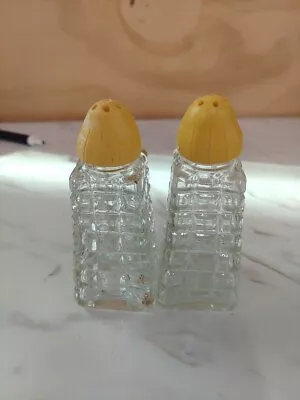 Vintage 1950 Glass Salt And Pepper Shakers. Yellow Tops  • $8.99