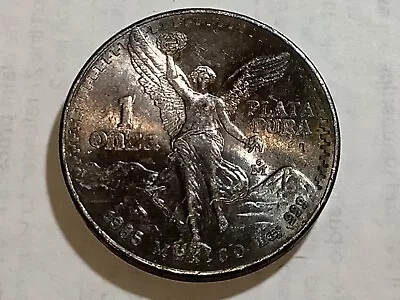 1985 Mo Toned Blue Silver Mexico  Libertad .999 Silver Dollar  Uncirculated Date • $6.50