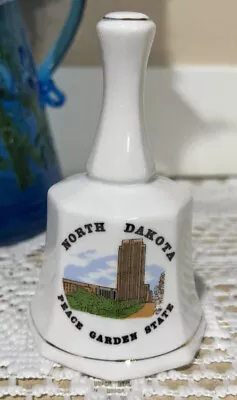 Vintage North Dakota Porcelain Bell Collector State Souvenir Estate EUC Gold • $15