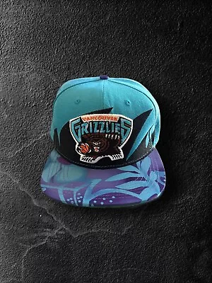 Vancouver Grizzlies Hat Mitchell & Ness Retro Shark Tooth Snapback Black & Teal  • $20