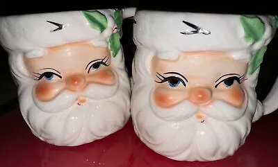 2 Vintage Christmas Santa Claus Mugs Santa Face Holiday Poinsettias White • $55.99