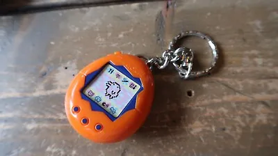 TAMAGOTCHI ORANGE KEYCHAIN 1997 BANDAI McDONALDS RETRO KEY CHAIN • $9.99