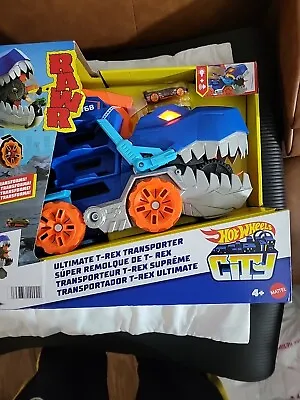 Hot Wheels City Ultimate Hauler Transforms Into Stomping T-Rex With Race Track.  • $69.99