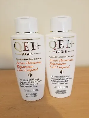 2 Bottles Of QEI+ Paris Skin Lightening Body Lotion With Carrot Extract 500ML • £74