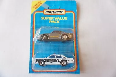 Matchbox Porsche 911 959 & Police Car Diecast Toy Sealed On Card  • £15.99