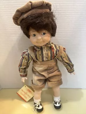 Vintage Heritage Mint Porcelain Boy Doll Brown Hair Blue Eyes • $8.99